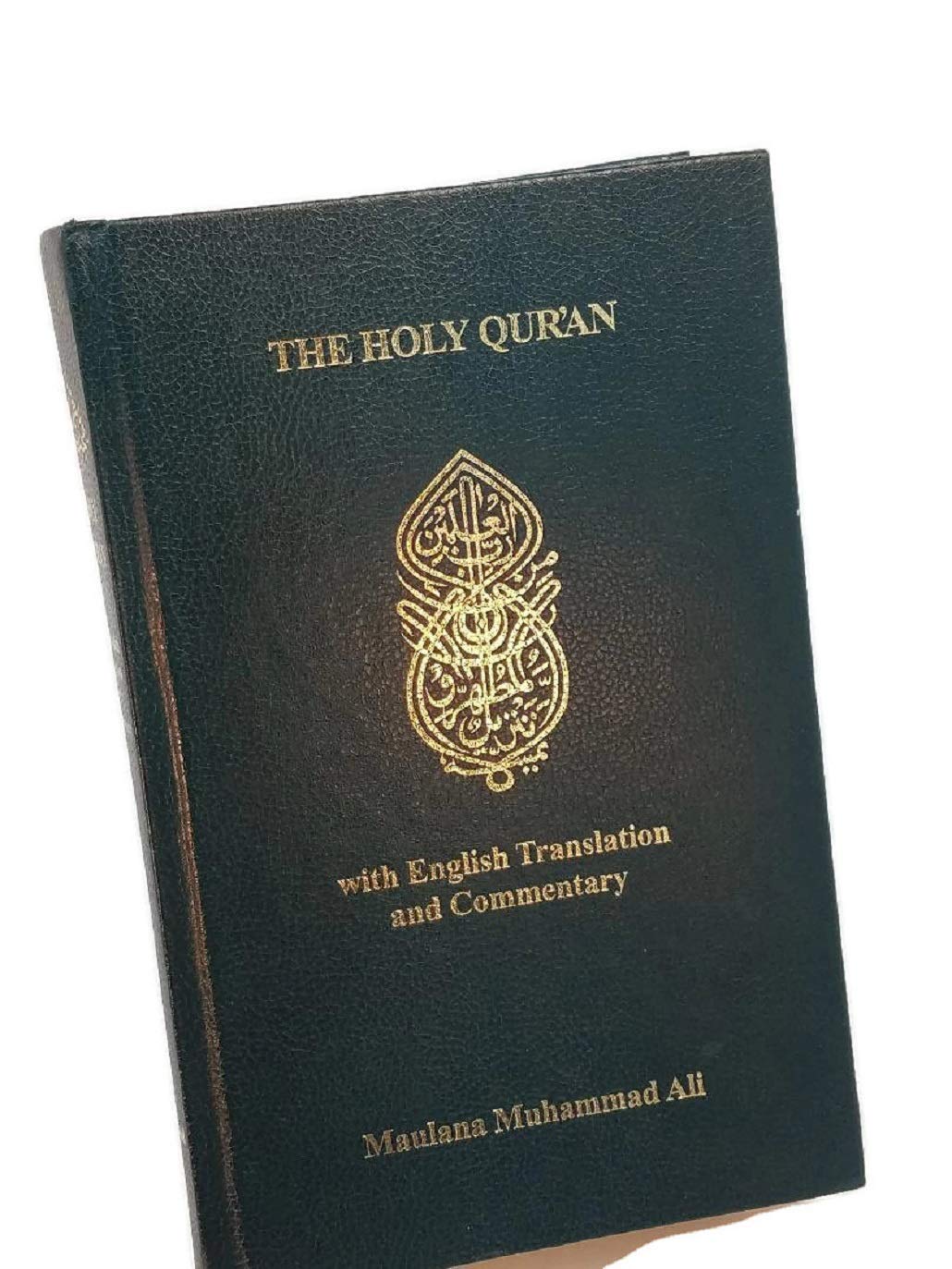 The Holy Qur'an with English Translation and Commentary