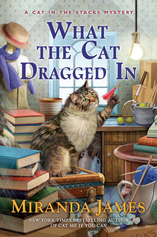 What the Cat Dragged In (Cat in the Stacks Mystery) - 9710
