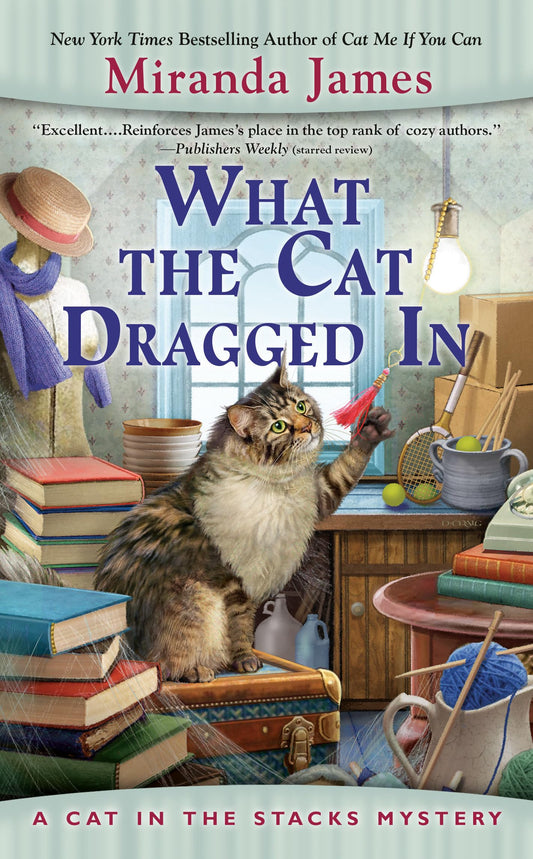 What the Cat Dragged In (Cat in the Stacks Mystery) - 4389